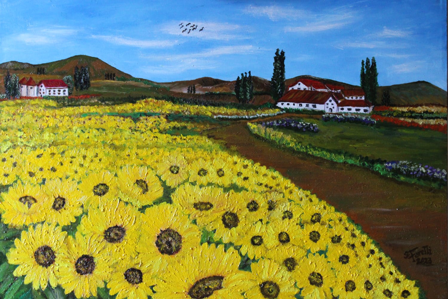 Tuscan landscape with sunflowers